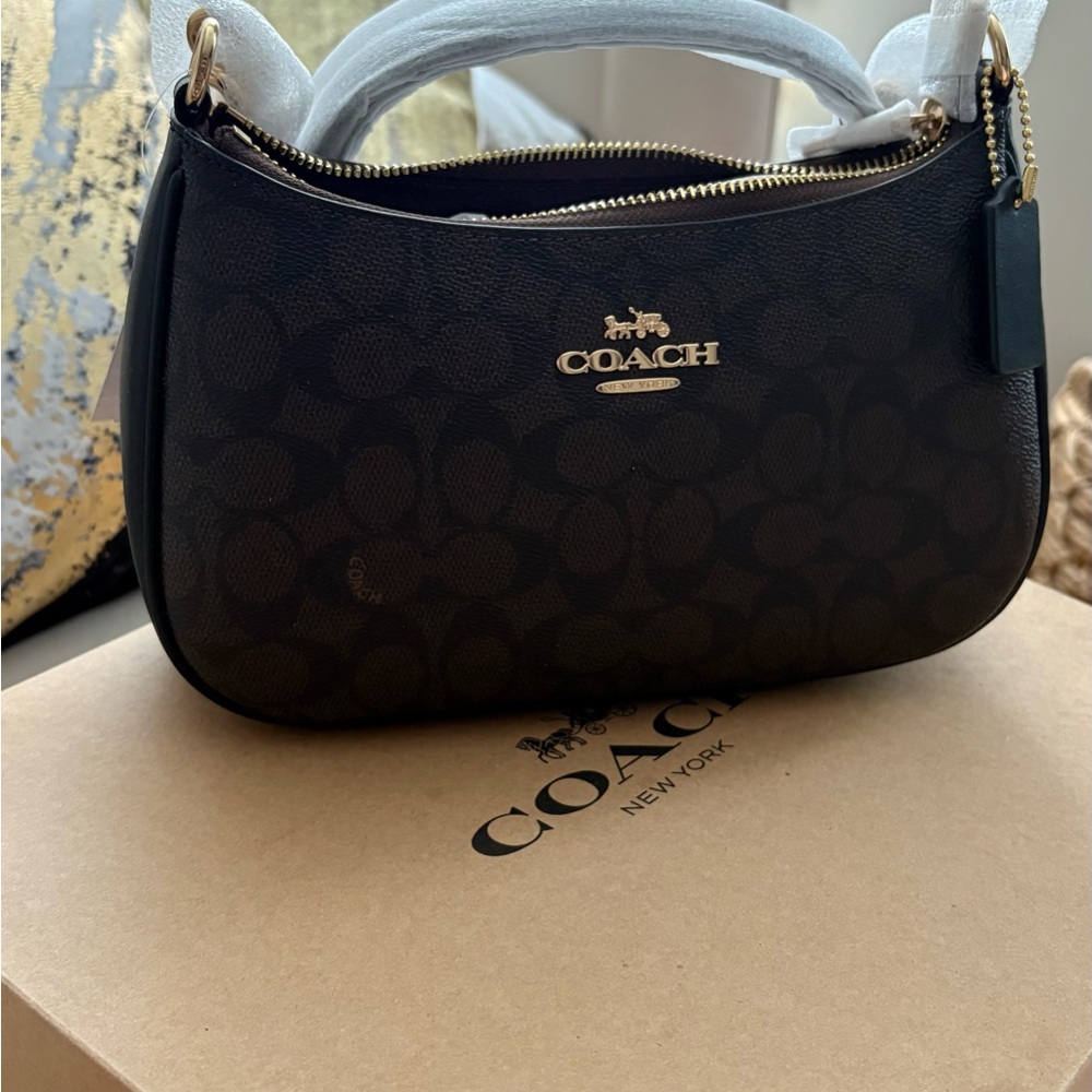 Coach Black Mini Bag with Gold Hardware and Textured Fabric